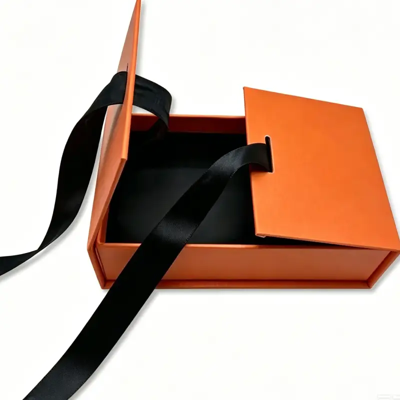orange perfume box with bow