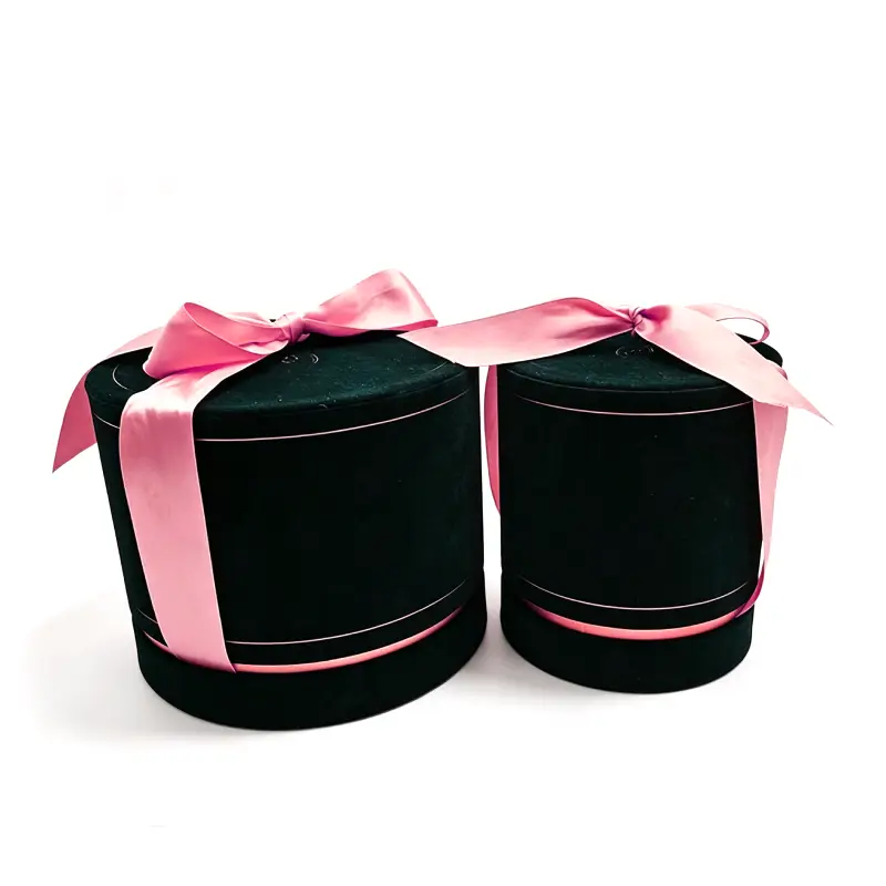 round candle box with bow
